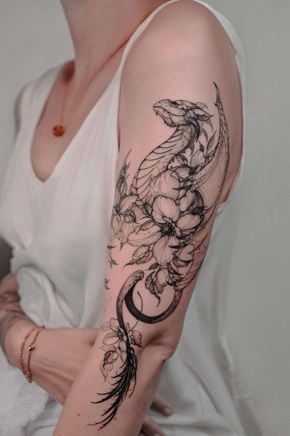 27 Empowering Dragon Tattoo With Flowers Ideas