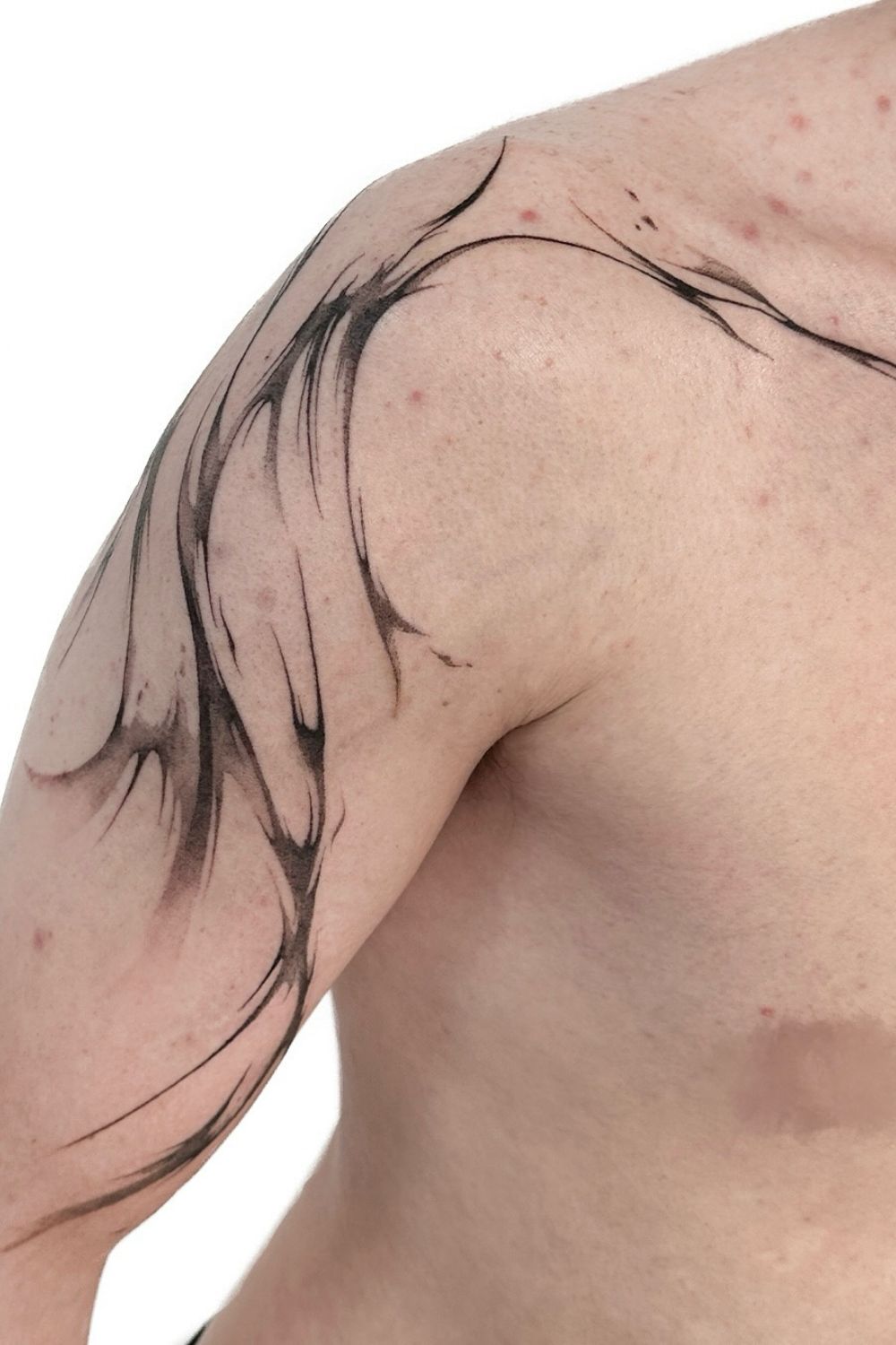 24 Men's Shoulder Tattoo Ideas