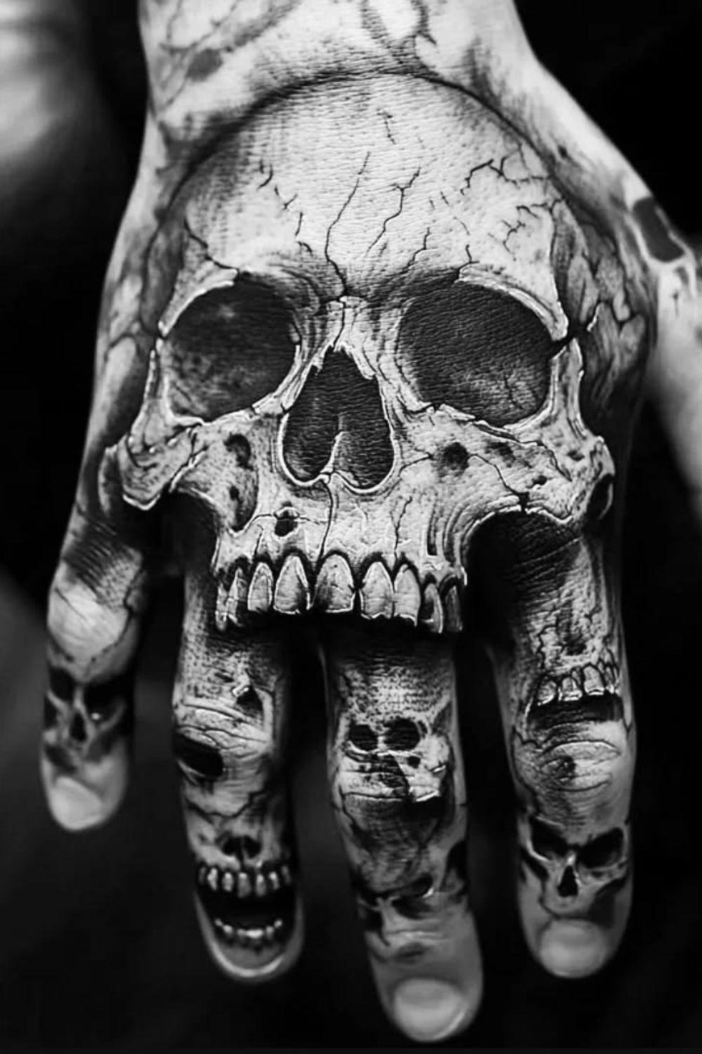 skull hand tattoo