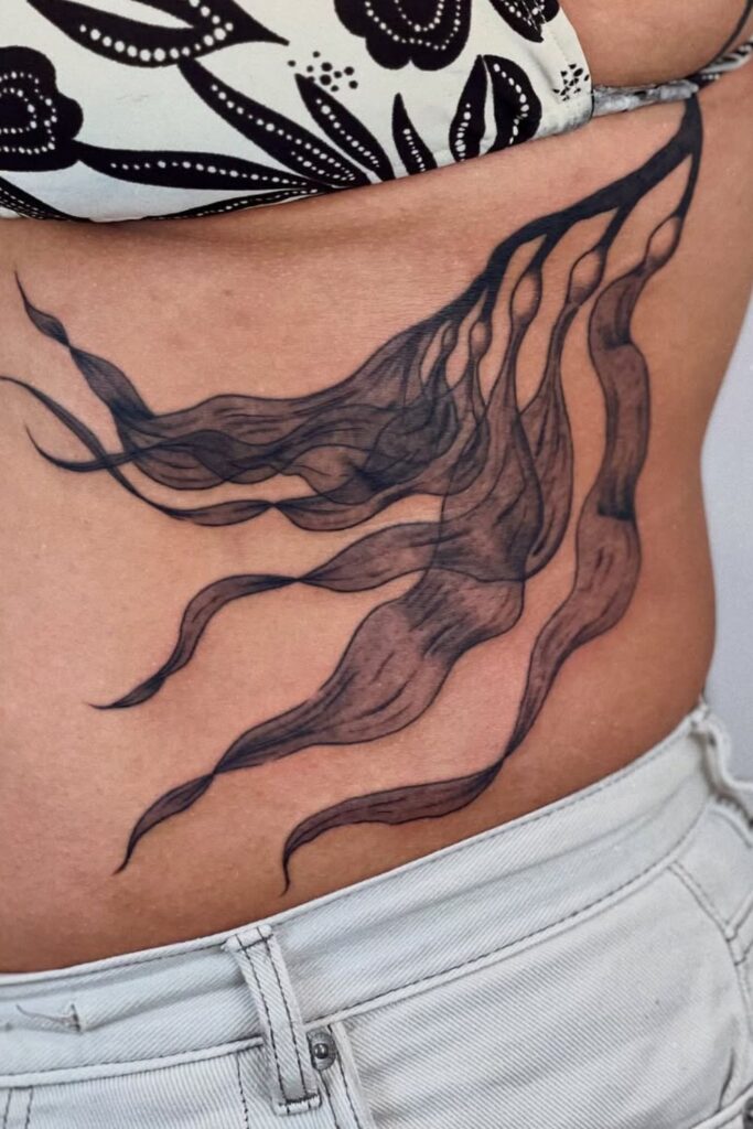 side tummy tattoos for women